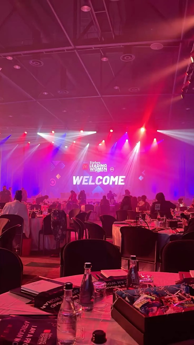Corporate summit production with full stage and lighting